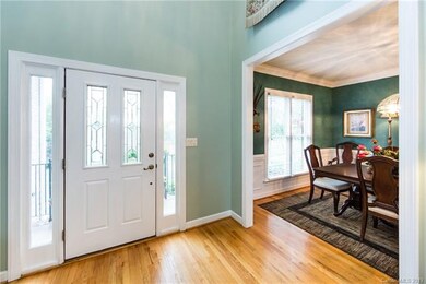 2 story entry foyer provides lots of natural light