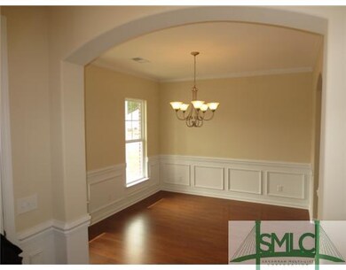 Other. Formal Dining Room with Elegant Wainscottin