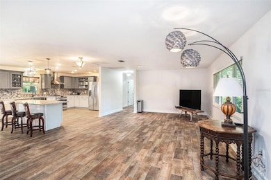 Living room with view of the kitchen