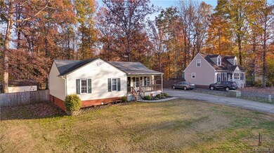 View of front of house featuring a front lawn and