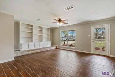 Built in Entertainment Center. Tile floors look li