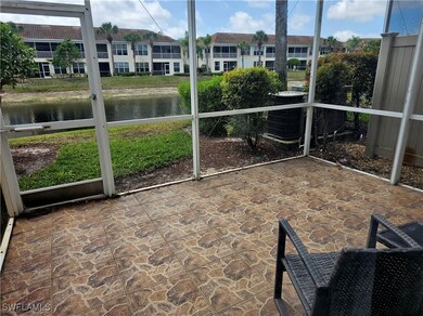 Unfurnished sunroom with a water view and a reside