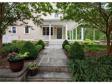 Side entrance under the covered wrap around porch 