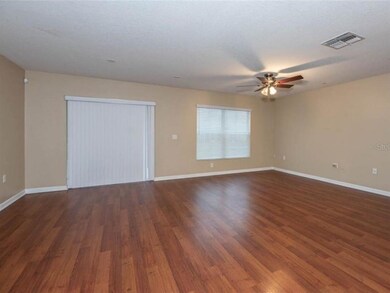 Great room with sliders going out to the covered p