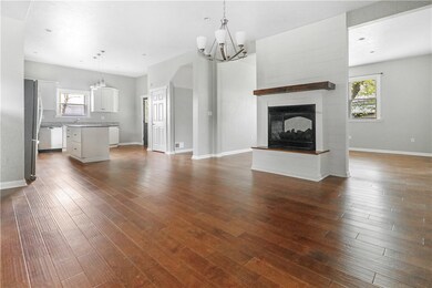 ONE VIEW OF OPEN CONCEPT MAIN LEVEL WITH TWO SIDED