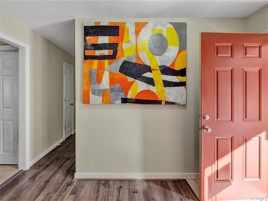 Welcoming foyer. Fresh paint and new flooring thro