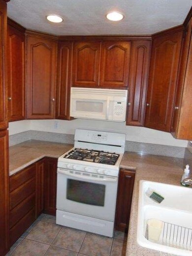 Remodeled Kitchen - custom cabinets to ceiling