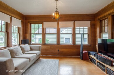 Enjoy relaxing in the front sun room/den.