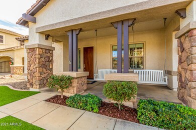 Front porch with porch swings