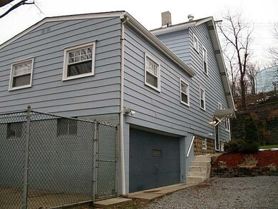 Exterior Back. Larger than it looks from the stree