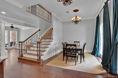 Dining area featuring crown molding and hardwood /