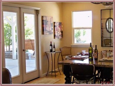 FORMAL DINING ROOM WITH FRENCH DOORS TO PATIO