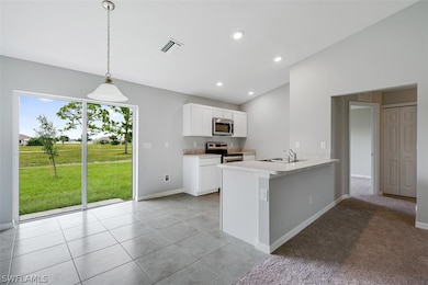 Photos are of completed property, colors and finishes may vary.