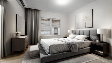 Bedroom with light wood finished floors