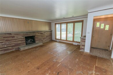 The carpet has been removed, creating a blank slate for your decorating ideas.  And look at those big, beautiful Pella windows with built in blinds!