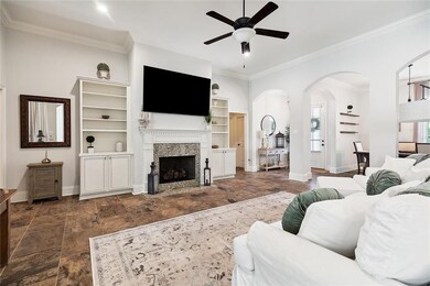 GAS FIREPLACE AND BEAUTIFUL BUILT INS FLANK BOTH S
