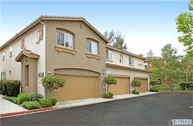 The direct-access two-car garage in this beautiful