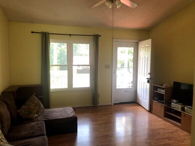 Spacious den with laminate floors