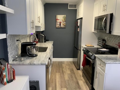 3038 Guildford C, Boca Raton, FL 33434 - photo 5