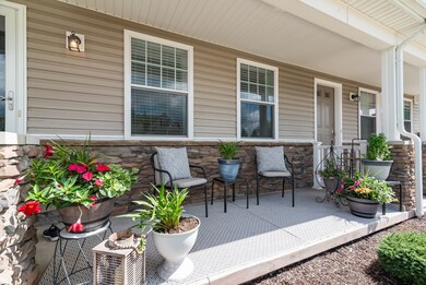 Inviting, covered front porch perfect for relaxing