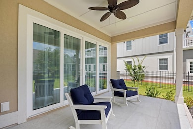 View of patio featuring a ceiling fan and tiled floor