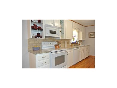 Kitchen features granite, hardwoods, wonderful app