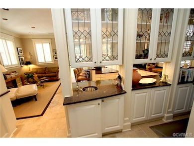 FROM THE BULTER'S PANTRY - THE STATE OF THE ART KITCHEN IS FIRST OBSERVED