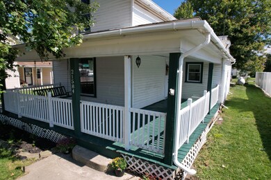 Beautiful wrap around porch with gate
