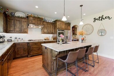 MARBLE COUNTER TOPS, GAS COOKTOP, DOUBLE OVENS