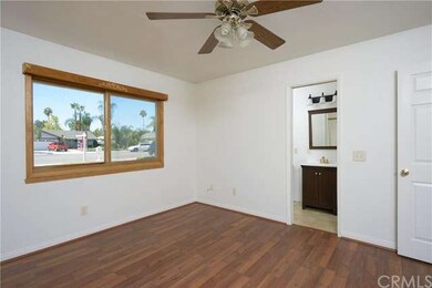Master bedroom with attached bath.  New laminate f