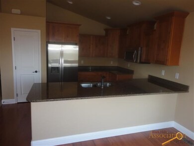 Alder cabinets, granite and stainless steel applia