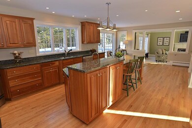 Custom kitchen with open floor plan,...