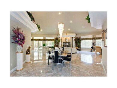 Property Photo. Glass doors in back of  great room