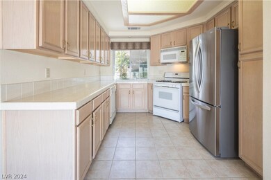 Kitchen with lots of cabinets for storage and new
