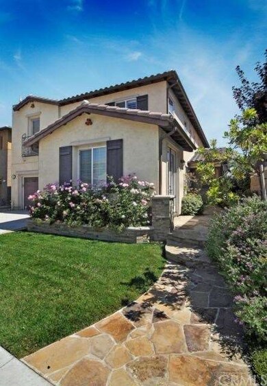Front of home, walkway to entrance