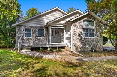 View of front of property featuring a front yard
