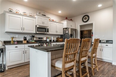 Gorgeous Kitchen cabinets and a large Breakfast ba