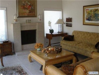 Many windows and sliding door overlooking backyard