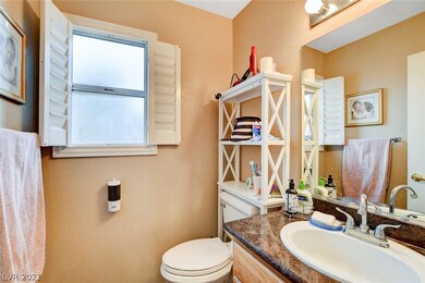 Down stairs half bath is between the great room an