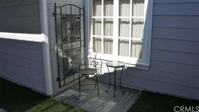 Small Custom black brick patio outside your front 