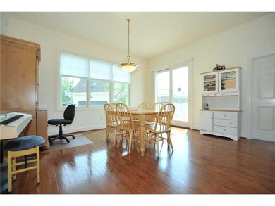 Great Room. Double doors lead to the deck, single 