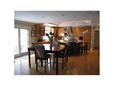 View of the kitchen dining area. Sliders lead to t