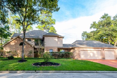 Large 3 car detached garage with nice side yard.  Covered walkway between garage and house.