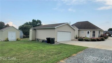 Behind garage is 12x16 shed