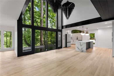 Light filled open concept layout with three story 