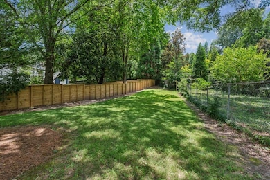 Flat, Fully Fenced Backyard