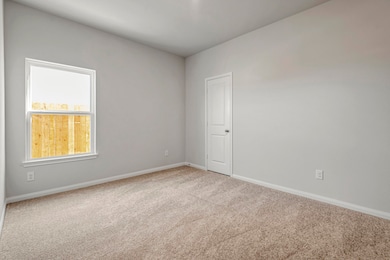 The two additional bedrooms in the home are perfec