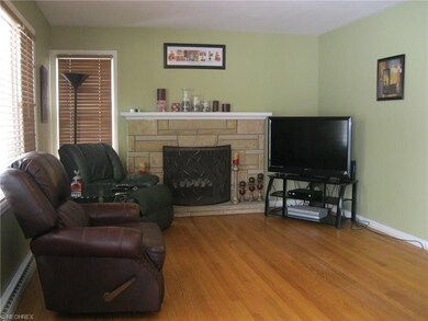 20' Living room with Hardwood floors, fireplace, l