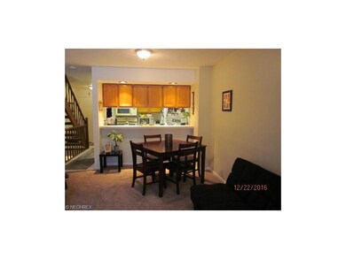 View from living room looking toward kitchen.  Tab