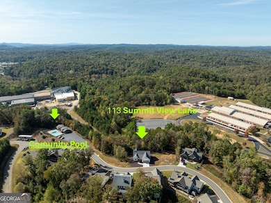 Aerial View of House and Community Pool